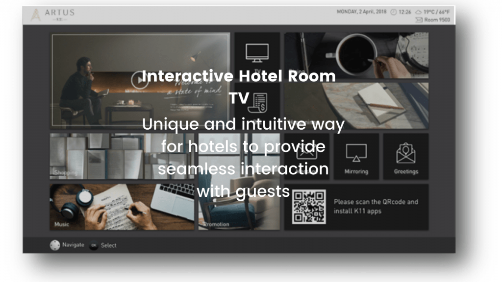A hotel room with a flat-screen TV displaying an IPTV interface with various entertainment options, Hotel IPTV system providers in Oman experience provided by TVCRAFTER for IPTV systems.